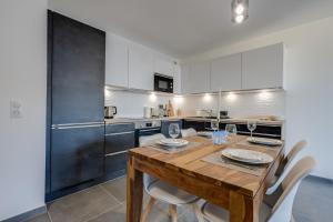 Η κουζίνα ή μικρή κουζίνα στο Le Paradis - Beautiful T2 ideally located with garage