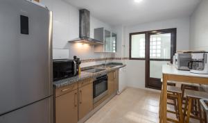 Kuchnia lub aneks kuchenny w obiekcie Alcaidesa Golf and Beach 2356