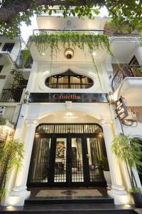 a building with a entrance to a store at Camellia Residence Hanoi in Hanoi