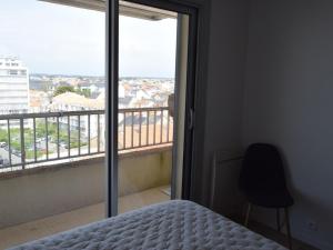 Ένα ή περισσότερα κρεβάτια σε δωμάτιο στο Appartement moderne 2 chambres, proche plage, jusqu'à 6 pers. - FR-1-197-423