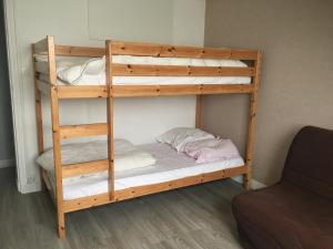 a bunk bed with a ladder next to a room at Appartement Fort-Mahon-Plage, 3 pièces, 6 personnes - FR-1-482-18 in Fort-Mahon-Plage