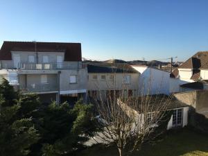 arial view of a city with houses and trees at Appartement Fort-Mahon-Plage, 3 pièces, 6 personnes - FR-1-482-18 in Fort-Mahon-Plage