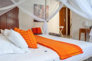 Tempat tidur dalam kamar di La Villa 126