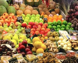 a display of fruits and vegetables in a market at Studio calme et éclairé proche de Nation C in Paris