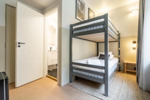 Letto o letti in una camera di Bob W Kluuvi