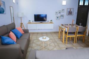 TV a/nebo společenská místnost v ubytování Casa Lola