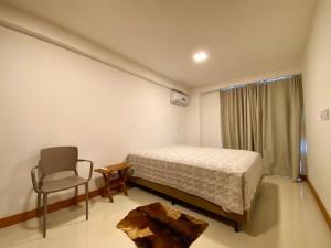 Ένα ή περισσότερα κρεβάτια σε δωμάτιο στο Residencial SAN MARINO BEIRA MAR +31 φωτογραφίες