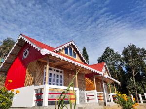 a house with a red roof at Boho Homestay, Rangbhang in Darjeeling