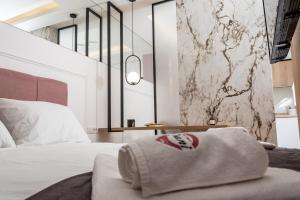 Ένα ή περισσότερα κρεβάτια σε δωμάτιο στο Apartman Dani Pale