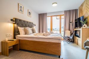 Posteľ alebo postele v izbe v ubytovaní Apartament Wielka Turnia by Apart Concept Podhale