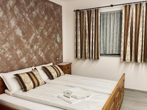 Postel nebo postele na pokoji v ubytování B&B L'Aigual