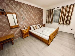 Postel nebo postele na pokoji v ubytování B&B L'Aigual