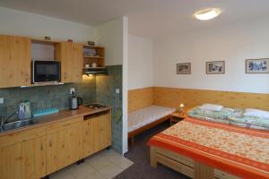 Posteľ alebo postele v izbe v ubytovaní Apartman 300