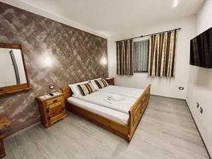 Postel nebo postele na pokoji v ubytování B&B L'Aigual
