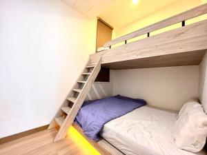 Letto o letti in una camera di Concept Suite 05 @ The Wave Residence
