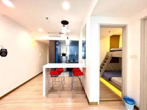 Letto o letti in una camera di Concept Suite 05 @ The Wave Residence