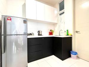 Cucina o angolo cottura di Concept Suite 05 @ The Wave Residence