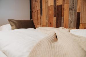 Łóżko lub łóżka w pokoju w obiekcie Hotel LÜ - Adults Only