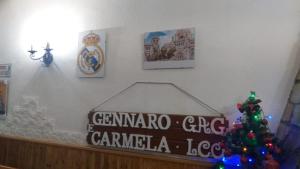 Certifikát, hodnocení, plakát nebo jiný dokument vystavený v ubytování Carmela e Gennaro casa vacanze