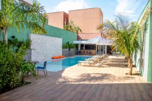 Πισίνα στο ή κοντά στο Lirio D'Água Hotel