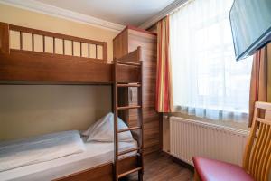 Postel nebo postele na pokoji v ubytování Hotel Alte Post