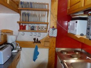 Una cocina o cocineta en Appartement Les Arcs 1800, 2 pièces, 6 personnes - FR-1-411-22