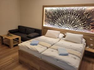 Katil atau katil-katil dalam bilik di Hotel Gól Prostějov