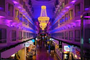 a view of a shopping mall with a chandelier at Silja Line ferry - Helsinki 2 nights return cruise to Stockholm in Helsinki