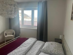 Apartment Gröbming Nord tesisinde bir odada yatak veya yataklar