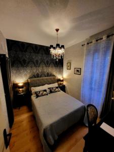 Кровать или кровати в номере GARDENHILL familly 2 chambres