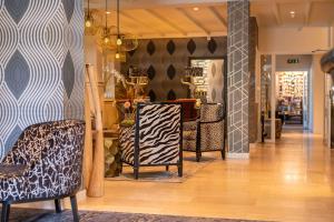 a store with a zebra patterned wall at Boutique Hotel Slenaker Vallei - Buitengewoongenieten in Slenaken