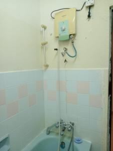 Um banheiro em D'Mentari - Cozy 3 Rooms Apartment