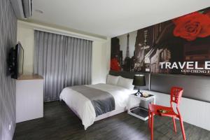 Postel nebo postele na pokoji v ubytování Guo Chen Hotel