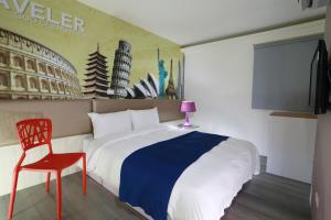 TV a/nebo společenská místnost v ubytování Guo Chen Hotel