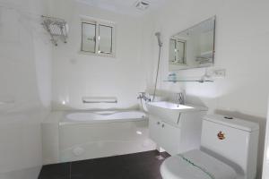 Koupelna v ubytování Guo Chen Hotel