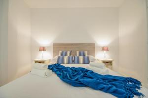 Posteľ alebo postele v izbe v ubytovaní Ideal Property Mallorca - Canet Beach
