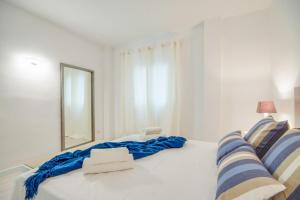 Posteľ alebo postele v izbe v ubytovaní Ideal Property Mallorca - Canet Beach