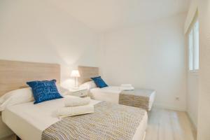 Posteľ alebo postele v izbe v ubytovaní Ideal Property Mallorca - Canet Beach