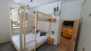Postel nebo postele na pokoji v ubytování Apartmány Pstruží AP19