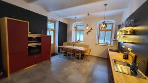 Kuchyň nebo kuchyňský kout v ubytování Apartmány Pstruží AP19
