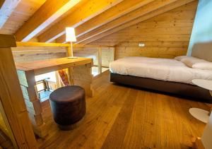 Voodi või voodid majutusasutuse Nendaz 4 Vallées & SPA 4* Superior toas