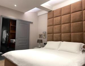 Postel nebo postele na pokoji v ubytování Vila Shard Boutique Hotel