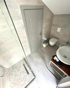 Koupelna v ubytování Vila Shard Boutique Hotel