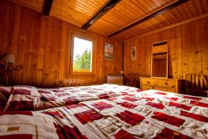 Postel nebo postele na pokoji v ubytování Chalet la Regin Anzere