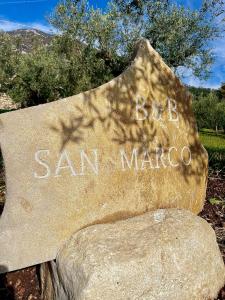 a stone sign with the words bob san marco at B&B San Marco in San Lorenzello
