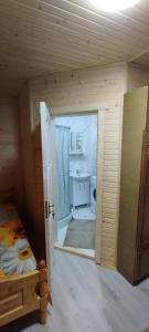 a small room with a bathroom with a sink at Гостинний двір Матійчуків Новий in Vorokhta