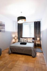 Posteľ alebo postele v izbe v ubytovaní ClickTheFlat Constitution Square Apart Rooms