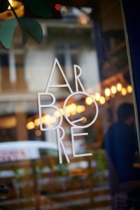 a sign on the window of a barber shop at Royal Madeleine Hotel & Spa in Paris