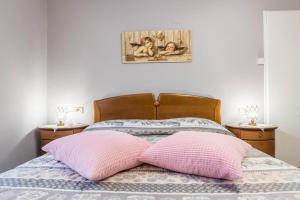 Кровать или кровати в номере Alla Fontana di Casa Bernardi