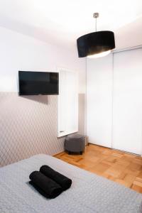 Posteľ alebo postele v izbe v ubytovaní ClickTheFlat Constitution Square Apart Rooms